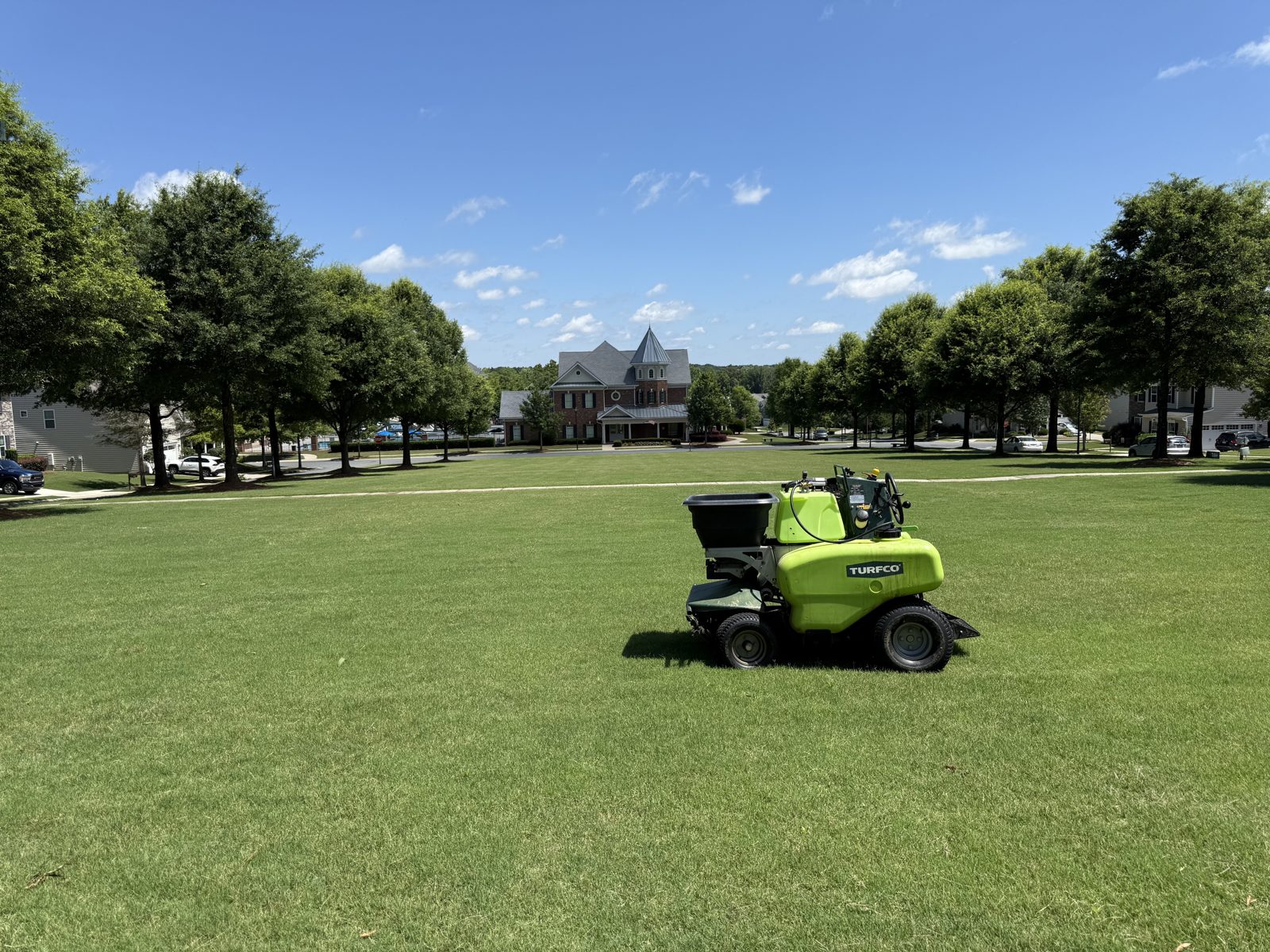 Turfco applicator on an HOA common area lawn