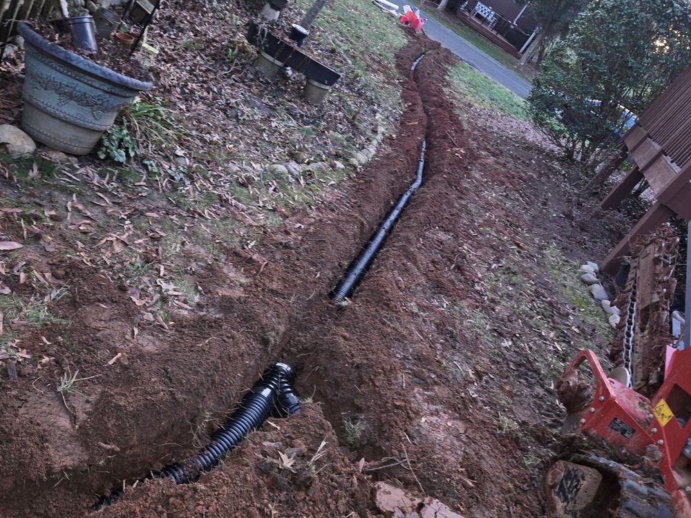 Irrigation installation with new pipe in an open trench